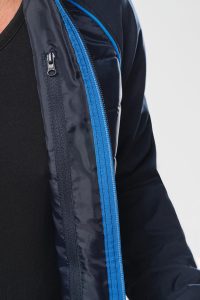 Fermeture contrastée de la veste softshell bi-matère BADEN